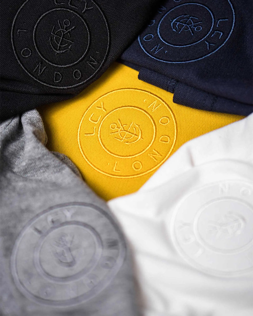 LCY LONDON | Embroidered Pocket Circle Logo Polo Shirt LCY London